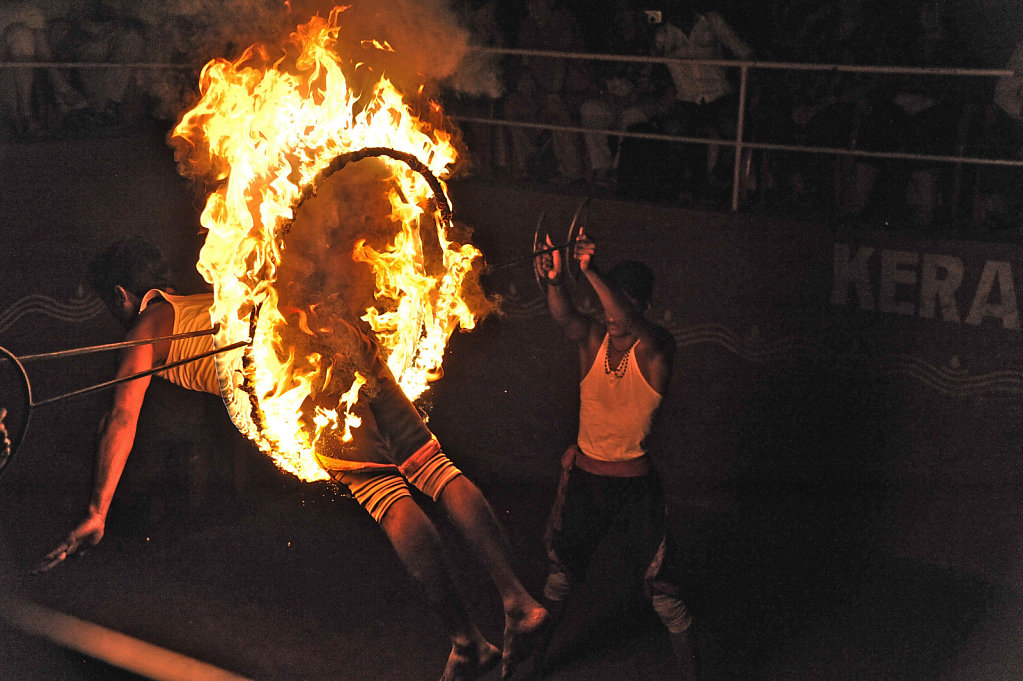 Jumping Through a Ring of Fire at an Exhibition of Kalaripayattu