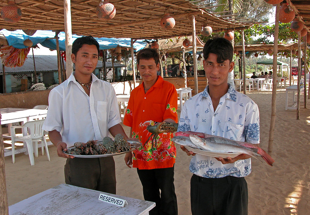 Waiters Displaying Seafood
